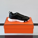Hermes Mens Sneaker H251121Z 02360 in Black – Front View of Luxury Black Sneakers with Orange H Logo