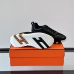 Hermes Mens Sneaker H251121Z 02360 in Black – Front View of Luxury Black Sneakers with Orange H Logo