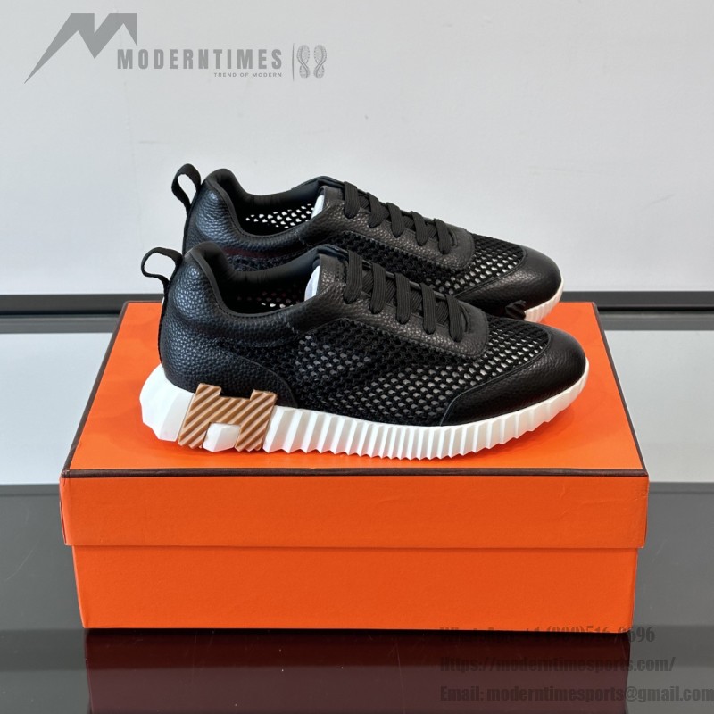 Hermes Mens Sneaker H251121Z 02360 in Black – Front View of Luxury Black Sneakers with Orange H Logo