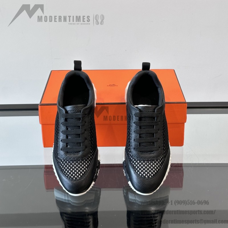 Hermes Mens Sneaker H251121Z 02360 in Black – Front View of Luxury Black Sneakers with Orange H Logo
