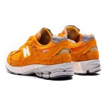 New Balance 2002R Protection Pack Vintage Orange M2002RDE – スタイリッシュで快適なスニーカー New Balance 2002R Protection Pack Vintage Orange M2002RDE スニーカー – スエードとメッシュデザイン
