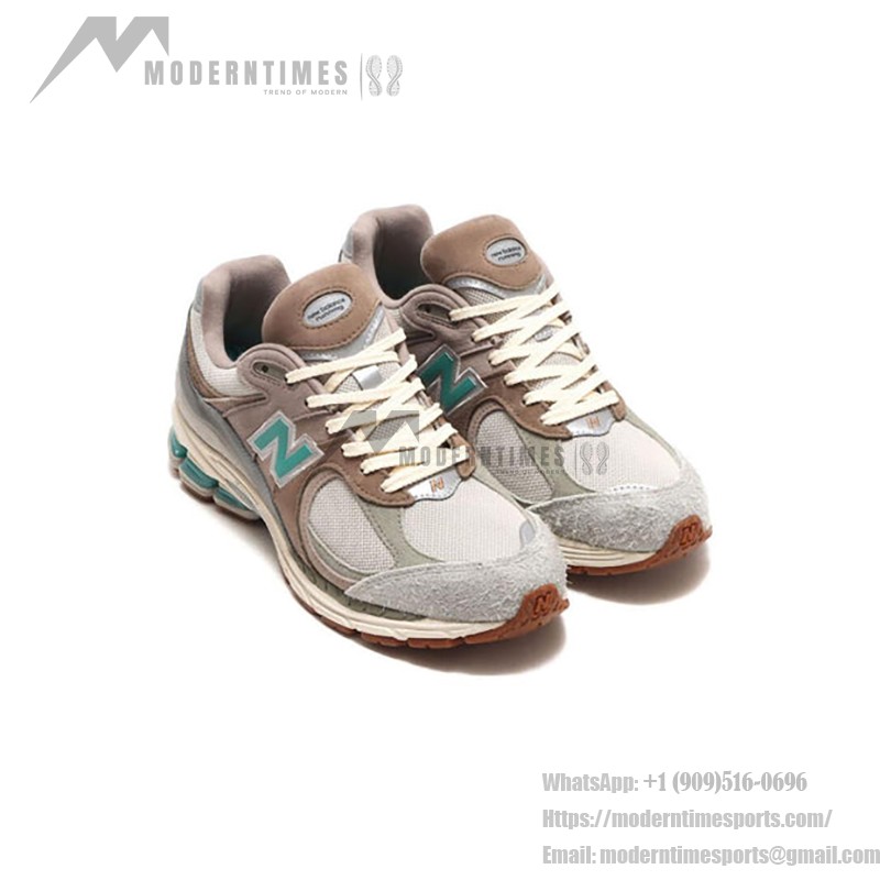 New Balance Atmos x 2002R Oasis M2002RAM – スタイリッシュで快適なスニーカー New Balance Atmos x 2002R Oasis M2002RAM スニーカー – スエードとメッシュデザイン