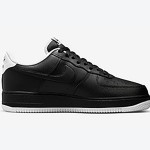 Nike Air Force 1 Low 'ブラック & ホワイト' - 洗練された黒のスニーカーと白のディテール Nike Air Force 1 Low 'ブラック & ホワイト' - 黒のスニーカーと白のアクセント