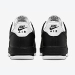 Nike Air Force 1 Low 'ブラック & ホワイト' - 洗練された黒のスニーカーと白のディテール Nike Air Force 1 Low 'ブラック & ホワイト' - 黒のスニーカーと白のアクセント