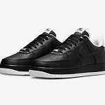 Nike Air Force 1 Low 'ブラック & ホワイト' - 洗練された黒のスニーカーと白のディテール Nike Air Force 1 Low 'ブラック & ホワイト' - 黒のスニーカーと白のアクセント