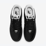 Nike Air Force 1 Low 'ブラック & ホワイト' - 洗練された黒のスニーカーと白のディテール Nike Air Force 1 Low 'ブラック & ホワイト' - 黒のスニーカーと白のアクセント
