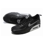 Nike Air Max 90 DX8969-001 - Bold Comfort & Sleek Design Nike Air Max 90 DX8969-001 - Black Sneakers with Grey Swoosh & Metallic Silver Midsole