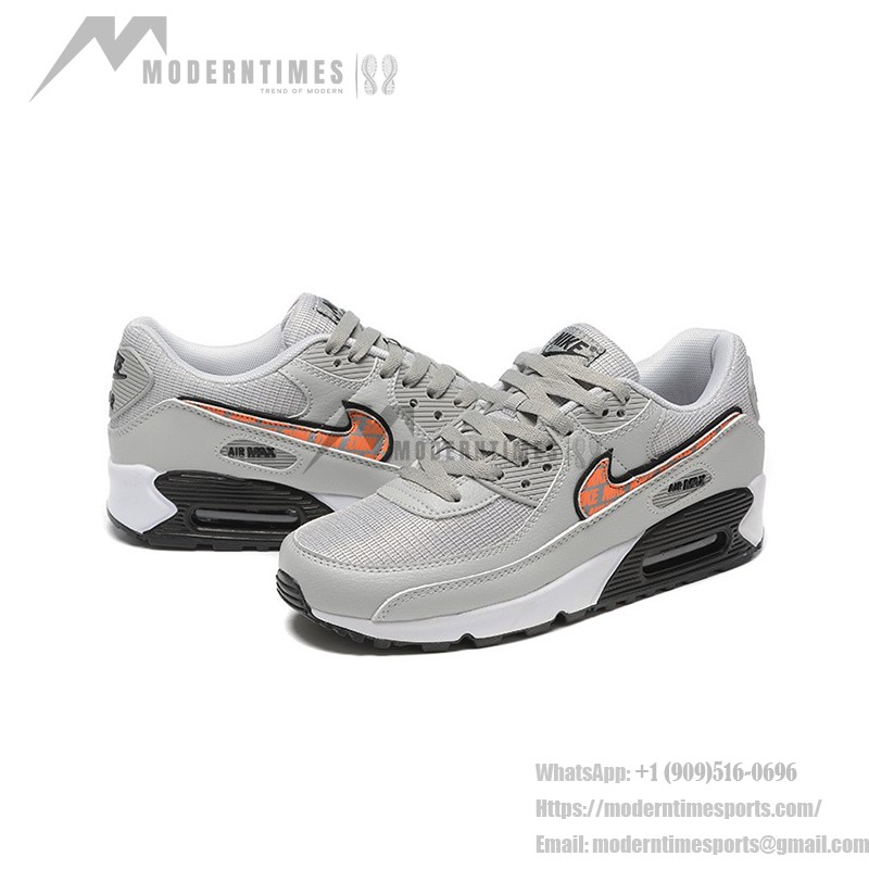 Nike Air Max 90 DZ5637-001 - グレーのスニーカー、ブラック&オレンジスウッシュ付き グレーのNike Air Max 90スニーカー、ブラックとオレンジのスウッシュが特徴的なデザイン。