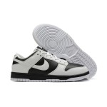 Nike Dunk Low "Reverse Panda" FD9064-011 スタイリッシュで快適な黒白スニーカー Nike Dunk Low "Reverse Panda" FD9064-011 黒白スニーカーのサイドビュー