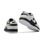 Nike Dunk Low "Reverse Panda" FD9064-011 スタイリッシュで快適な黒白スニーカー Nike Dunk Low "Reverse Panda" FD9064-011 黒白スニーカーのサイドビュー