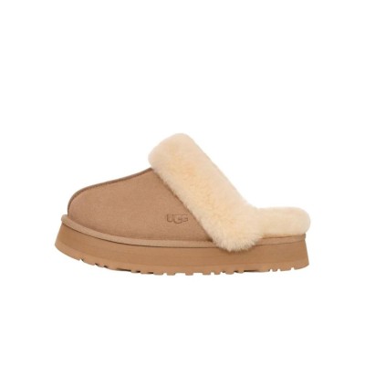 UGG ウィメンズ ディスケット スリッパ サンド 1122550 - 室内外兼用の快適なシープスキン プラットフォームスリッパ
