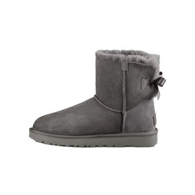 UGG ウィメンズ ミニ ベイリー ボウ II ブーツ グレー 1016501 - スタイリッシュなスエードブーツ、シープスキンライニングとリボンディテール付き