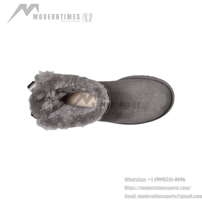 UGG ウィメンズ ミニ ベイリー ボウ II ブーツ グレー 1016501 UGG ウィメンズ ミニ ベイリー ボウ II ブーツ グレー 1016501、シープスキンライニングとリボンディテール付き