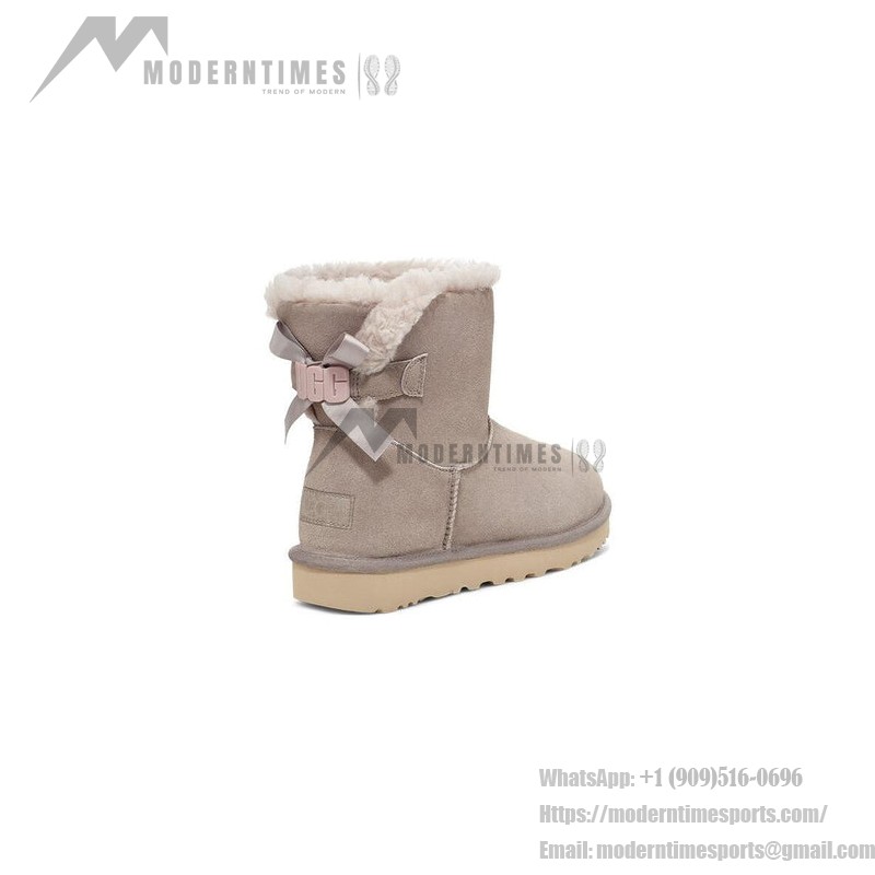 UGG Women's Mini Bailey Bow II Grey 1153611 - Warm and Stylish Ankle Boots with Bow Detail UGG Women's Mini Bailey Bow II Grey 1153611 - Cozy Sheepskin Ankle Boots with Stylish Bow Detail