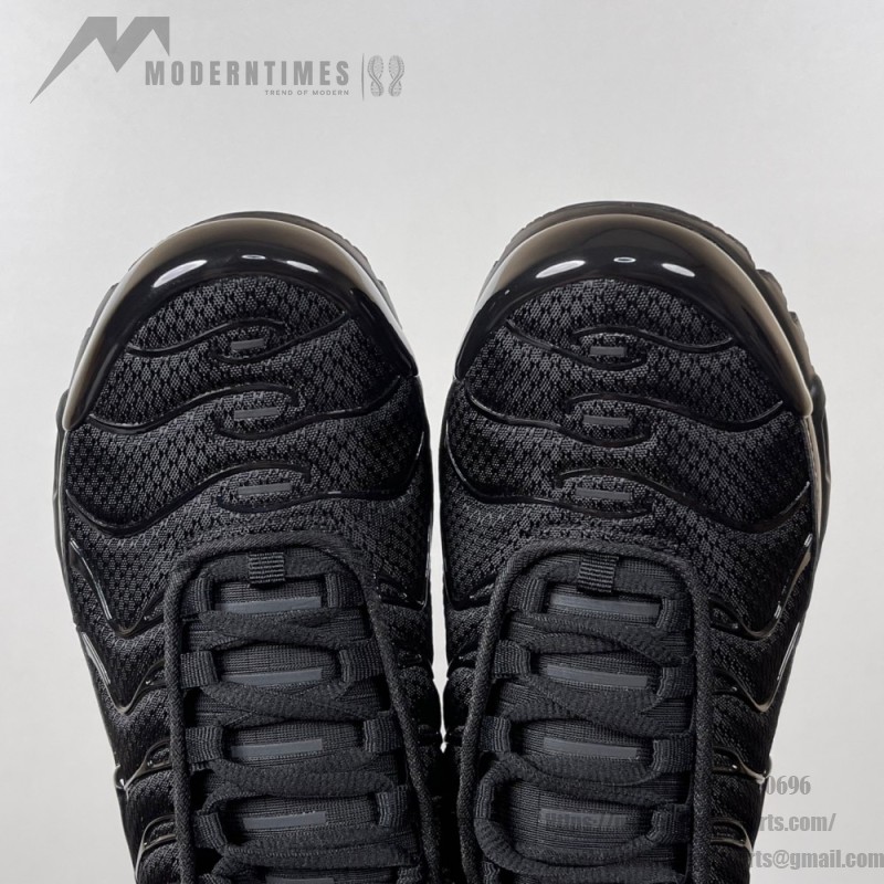 Nike Air Max Plus 604133-050 Triple Black TN sneakers with all-black streetwear styling