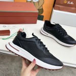 Loro Piana FAM1718-8000 Black Leather Sneakers Loro Piana FAM1718-8000 Black Sneakers Front View with White and Brown Detailing