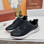 Loro Piana FAM1718-8000 Black Leather Sneakers Loro Piana FAM1718-8000 Black Sneakers Front View with White and Brown Detailing