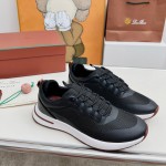 Loro Piana FAM1718-8000 Black Leather Sneakers Loro Piana FAM1718-8000 Black Sneakers Front View with White and Brown Detailing