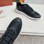 Loro Piana FAM1718-8000 Black Leather Sneakers Loro Piana FAM1718-8000 Black Sneakers Front View with White and Brown Detailing