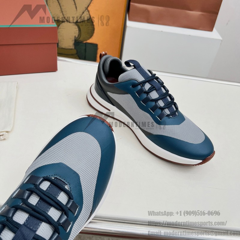 Loro Piana FAM1718-F3DW marineblaue Ledersneaker Loro Piana FAM1718-F3DW marineblaue Sneaker Vorderansicht mit grauen und braunen Details