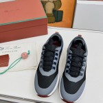 Loro Piana FAM1718-8000 Black Leather Sneakers Loro Piana FAM1718-8000 Black Sneakers Front View with White and Brown Detailing