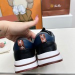 Loro Piana FAM1718-8000 Black Leather Sneakers Loro Piana FAM1718-8000 Black Sneakers Front View with White and Brown Detailing