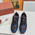 Loro Piana FAM1718-8000 Black Leather Sneakers Loro Piana FAM1718-8000 Black Sneakers Front View with White and Brown Detailing