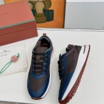 Loro Piana FAM1718-8000 Black Leather Sneakers Loro Piana FAM1718-8000 Black Sneakers Front View with White and Brown Detailing