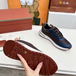 Loro Piana FAM1718-8000 Black Leather Sneakers Loro Piana FAM1718-8000 Black Sneakers Front View with White and Brown Detailing