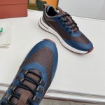 Loro Piana FAM1718-8000 Black Leather Sneakers Loro Piana FAM1718-8000 Black Sneakers Front View with White and Brown Detailing