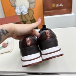 Loro Piana FAM1718-8000 Black Leather Sneakers Loro Piana FAM1718-8000 Black Sneakers Front View with White and Brown Detailing
