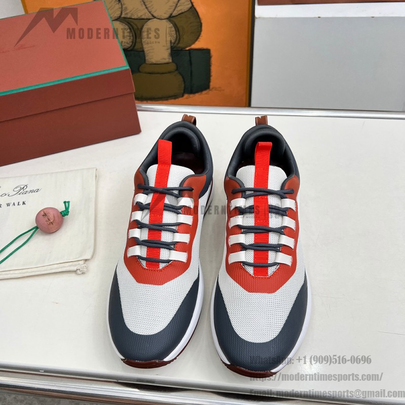 Loro Piana FAM1718-8000 Black Leather Sneakers Loro Piana FAM1718-8000 Black Sneakers Front View with White and Brown Detailing