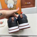 Loro Piana FAM1718-8000 Black Leather Sneakers Loro Piana FAM1718-8000 Black Sneakers Front View with White and Brown Detailing