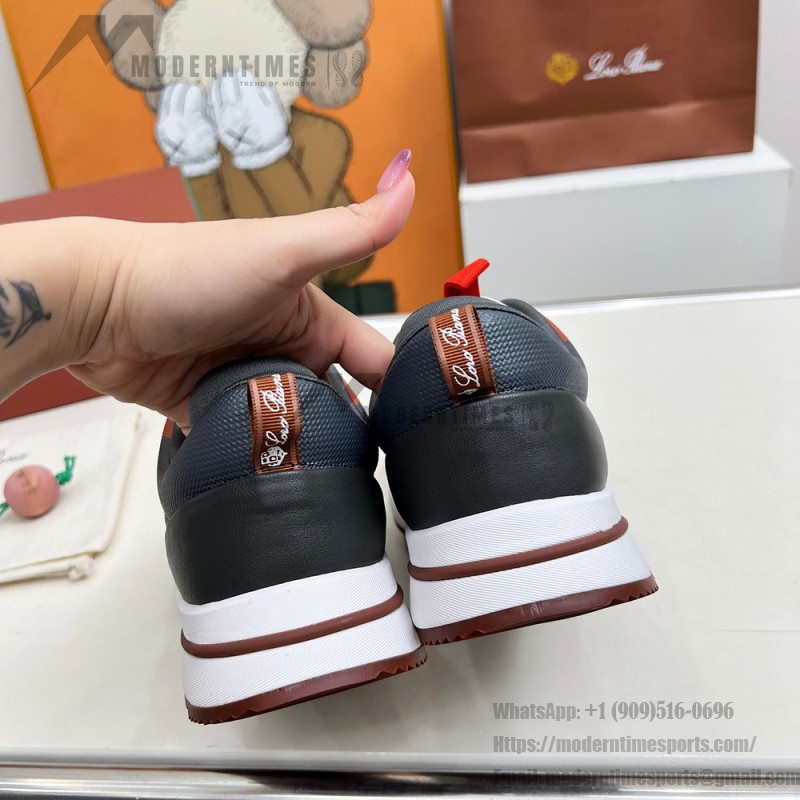 Loro Piana FAM1718-8000 Black Leather Sneakers Loro Piana FAM1718-8000 Black Sneakers Front View with White and Brown Detailing